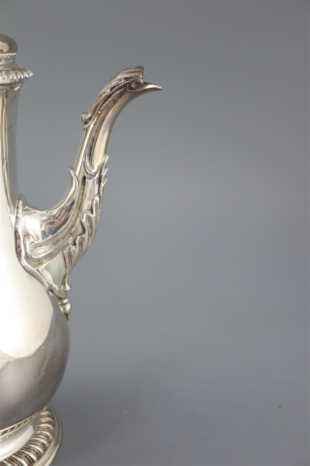 A modern 18th century style silver baluster coffee pot, by Spink & Son, gross 36oz.